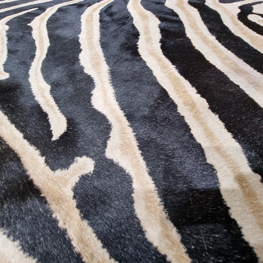 Cowhide rug | Cowhide stenciled with realistic zebra print pattern 5